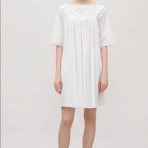 White dress with gathered front